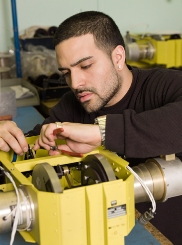 man working at machine close up